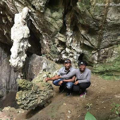 A limestone formation that has caught the attention of two visitors.
