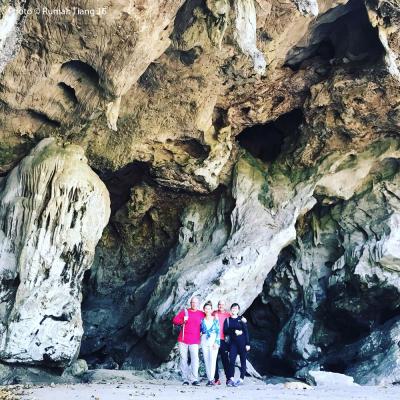 At one of the imposing cave entrances.