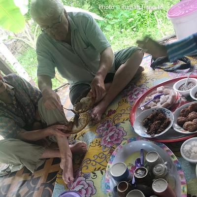 Sitting comfortably to enjoy the meal, sans table and chairs.