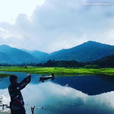 A mirror reflection of the serene river.