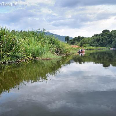 Fishing by the locals, a common scene along the river ride.